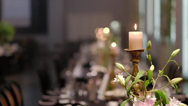 Candles on candlestick for the party . HD video.