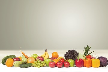 Colorful ripe vegetables and fruits isolated on white