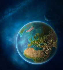 Planet Earth with highlighted Slovakia in space with Moon and Milky Way. Visible city lights and country borders.