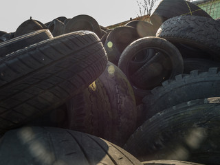 Old tires. Old tire dump. Old tire closeup.