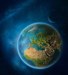 Planet Earth with highlighted Macedonia in space with Moon and Milky Way. Visible city lights and country borders.