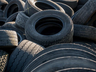 Obraz premium Old tires. Old tire dump. Old tire closeup.