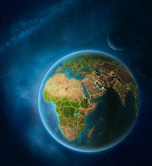 Planet Earth with highlighted Djibouti in space with Moon and Milky Way. Visible city lights and country borders.