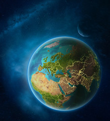 Planet Earth with highlighted Georgia in space with Moon and Milky Way. Visible city lights and country borders.