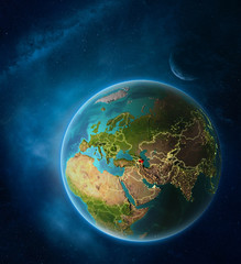 Planet Earth with highlighted Azerbaijan in space with Moon and Milky Way. Visible city lights and country borders.