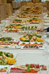 delicious dishes on the table in the restaurant. serving table.