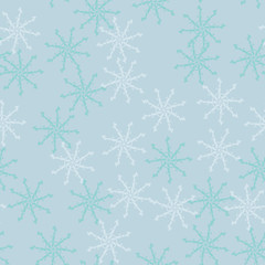 Fototapeta na wymiar Winter seamless pattern with chaotic snowflakes in different shades of blue color
