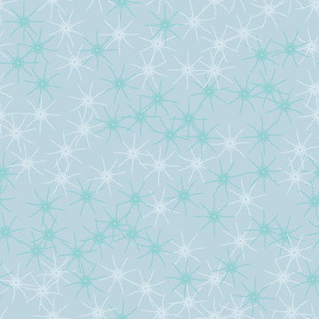 Winter seamless pattern with chaotic snowflakes in different shades of blue color © Ko_Te