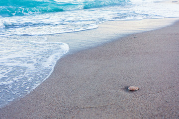 Blue waves in the sand