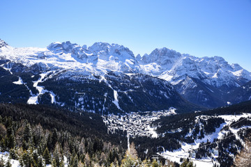 view from the top of the snowy Alps and country to the valley