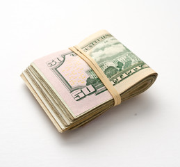 Wad of $50 Bills on a White Background