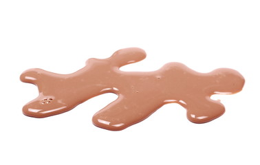 Spilled chocolate milk puddle isolated on white background