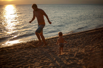 Playtime on beach with daddy