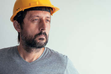 Portrait of serious thoughtful construction engineer
