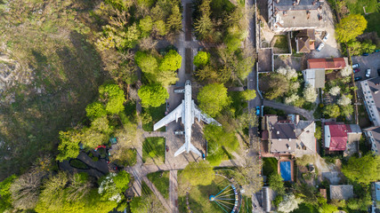 Aerial view of the plane, which stands in a park in the city center