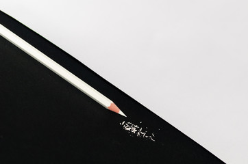 White Pencil With Shaving Isolated on black background.
