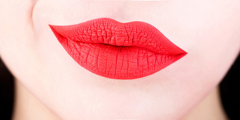 Sexy lips. Red lip. Close up of sexy plump soft lips with red lipstick. Face skin mouth perfection flawless concept. Sensual mouth, sexy lip, smile. Closeup, sexy mouth, sensual makeup, isolated.