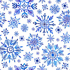 Watercolor snowflakes seamless pattern. Blue snowflakes on a white background.