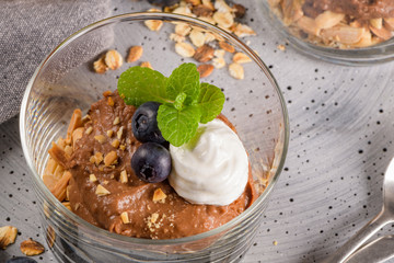 Glass cups of chocolate and chestnuts mousse