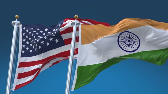 4k Seamless United States of America And India Flags with blue sky background,A fully digital rendering,The flag 3D animation loops at 20 seconds,USA IND IN.