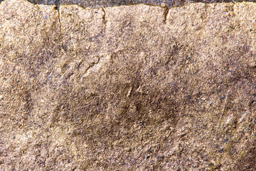 Raugh gold metal grainy surface . Beautiful textured background