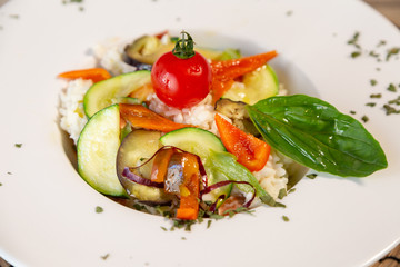Close up of vegan food with rice and fresh vegetables