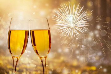 Glasses of champagne on holiday background