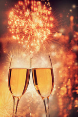 Glasses of champagne on holiday background