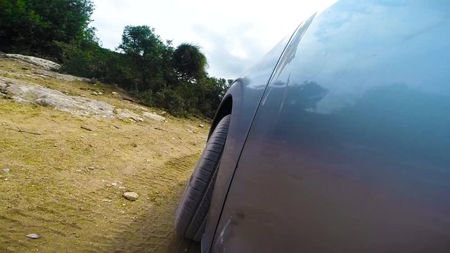 The view from the camera mounted on the jeep on an off road trip through the country side
slow motion 60 fps
