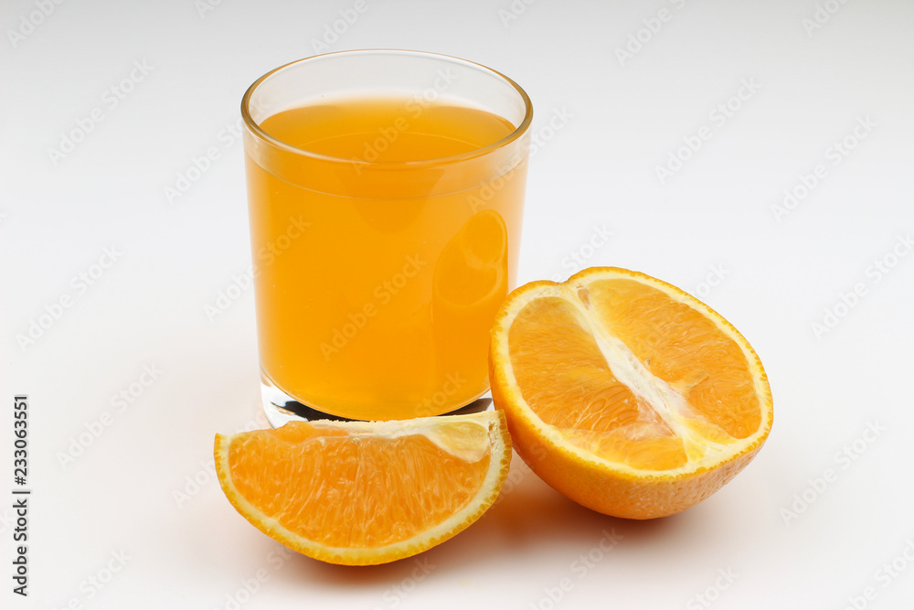 Wall mural juice and orange on a white background