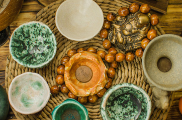 Chinese tea ceremony with Anchnag on wooden background