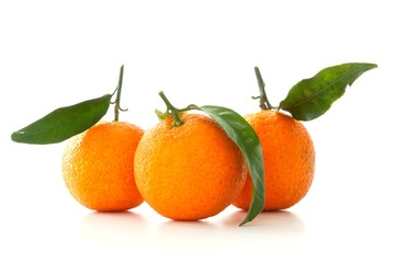 tangerines with leaves isolated on white