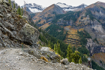 Rugged High Mountain Road - A cloudy autumn day on rugged 4X4 Black Bear Pass trail at side of...