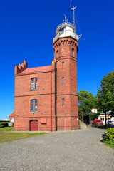 Ustka, Pomerania, Poland - Historic lighthouse building at the Baltic Sea shoreline and Slupia river in Ustka © Art Media Factory