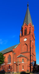 Fototapeta na wymiar Ustka, Pomerania, Poland - Neo-gothic church of Holiest Saviour in Ustka at the Baltic Sea shoreline