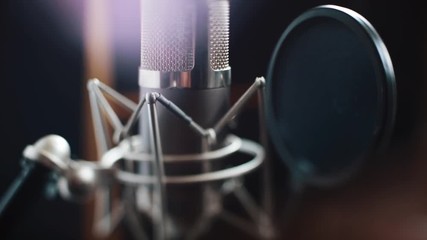 microphone in recording studio entertainment media music professional radio sound recording rock singing stage sound actor technology voice communication equipment musical