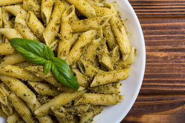 Italian penne pasta with sauce pesto