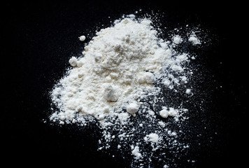 bunch of flour on a black background