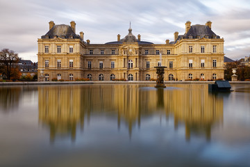 Fototapeta na wymiar Paris, France - November 12, 2018: Luxembourg public gardens and French Senate in Paris, France