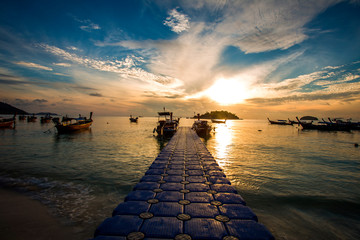 sunrise scenery at koh lipe island,thailand.soft focus,blur due to long exposure. visible noise due...