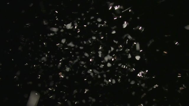 Falling Shiny Hearts At Night. Slow Motion.