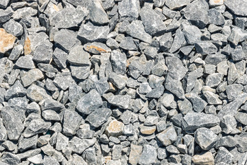 detail of grey and blue slate stone chips
