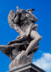 Baroque sculpture of an angel by Gian Lorenzo Bernini on the Pont Sant Angelo in Rome, Italy