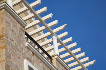 Architectural background with white details and blue sky