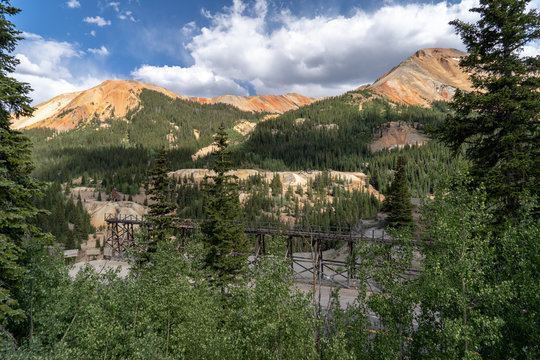 Idarado Mine in the Colorado Sneffels-Red Mountain-Telluride mining district has remnants left easily visible from the Million Dollar Highway near Ouray and Silverton CO