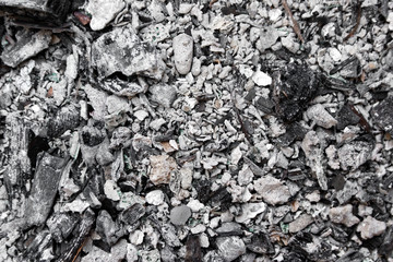 Gray ash from the oven background texture, cinder, grey ashes from the wood from the fireplace