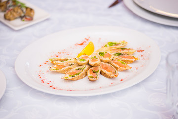 Top view on buffet table with different tasty snacks. Menu, banquet, party, appetizer concept