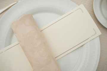 Wedding blank white paper on a dish