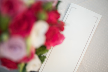Blank white paper with red and white flowers