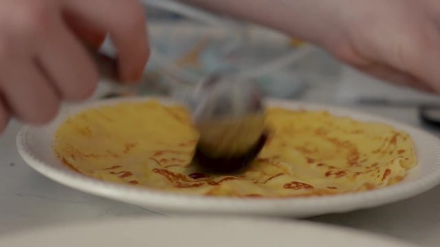 Making and filing pancakes. Low camera angle. And bright exposure.